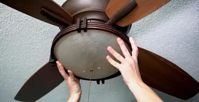 Ceiling fan repair and reinstallation on ceiling mount in Phoenix, AZ