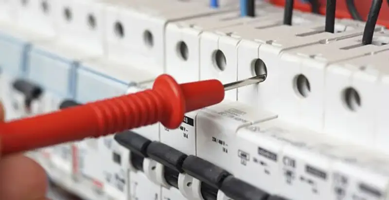 Electrical contractor testing circuit breakers during electrical repair in Scottsdale, AZ