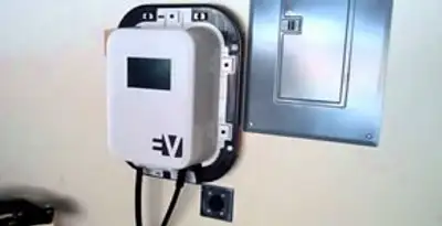 Electric car charger installation with wall-mounted EV charging station in Phoenix, AZ