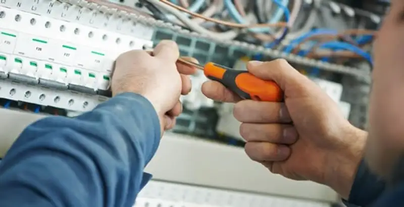 electrical service showing licensed electrician performing electrical panel maintenance and adjustments in Phoenix, AZ