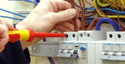 electrician services performing professional electrical panel wiring and connections in Phoenix, AZ