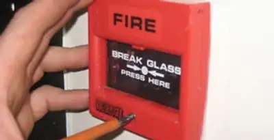 fire alarm installation service showing manual fire alarm pull station installed by licensed electricians in Phoenix, AZ