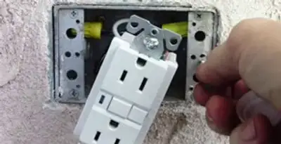 gfci circuits service showing installation of a ground fault circuit interrupter outlet by licensed electricians in Phoenix, AZ