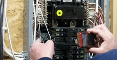 Home electrical inspection of circuit breaker panel by licensed electrician in Phoenix, AZ