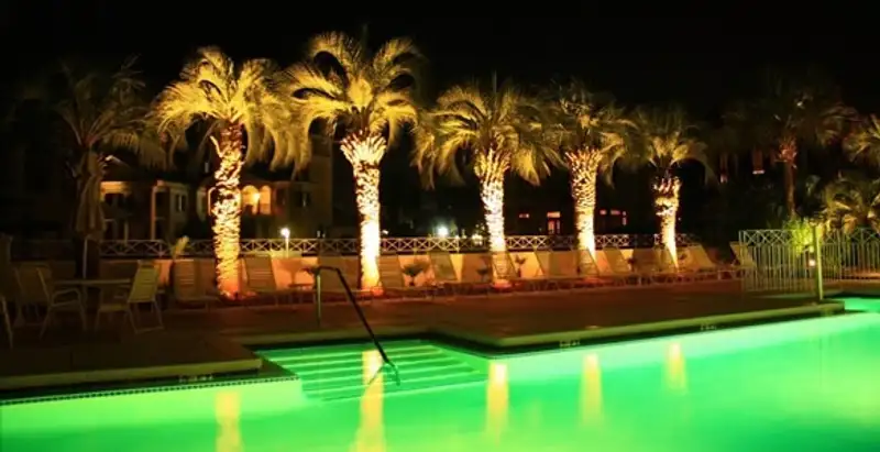 landscape lighting installation services illuminating outdoor recreational areas in Phoenix, AZ