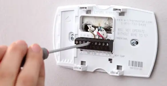 Thermostat installation service with proper wiring and secure wall mounting in Phoenix, AZ
